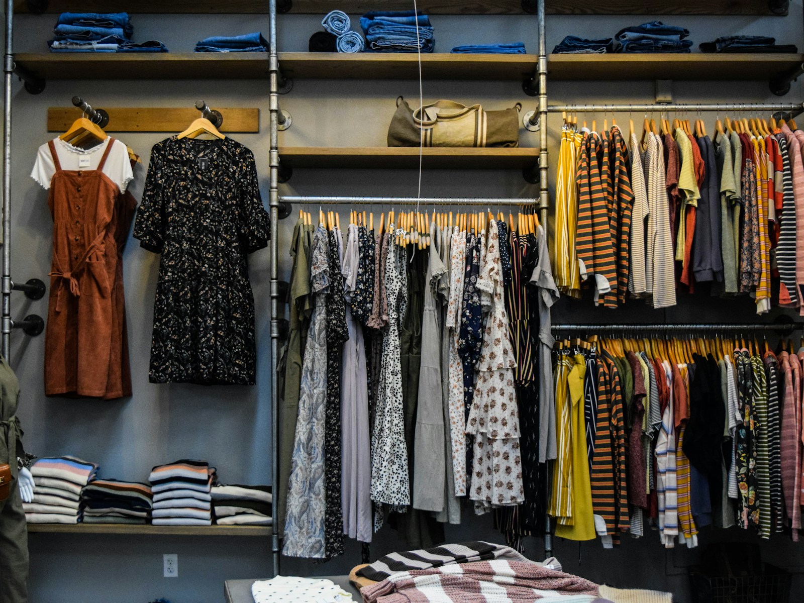 Curated retail boutique interior — apparel and lifestyle merchandise on display