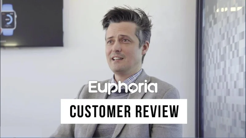 Euphoria Telecom customer review video — a business customer being interviewed about their experience with Euphoria, with Euphoria 'Customer Review' branding overlaid